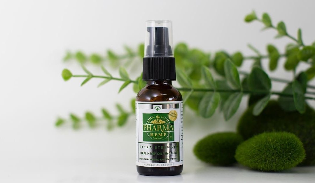 Benefits of CBD - Bottle with Green leafs