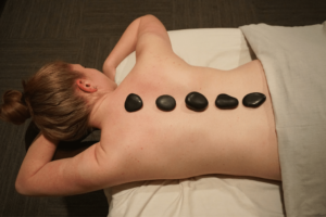 Hot Stone Massage with Stone on Back