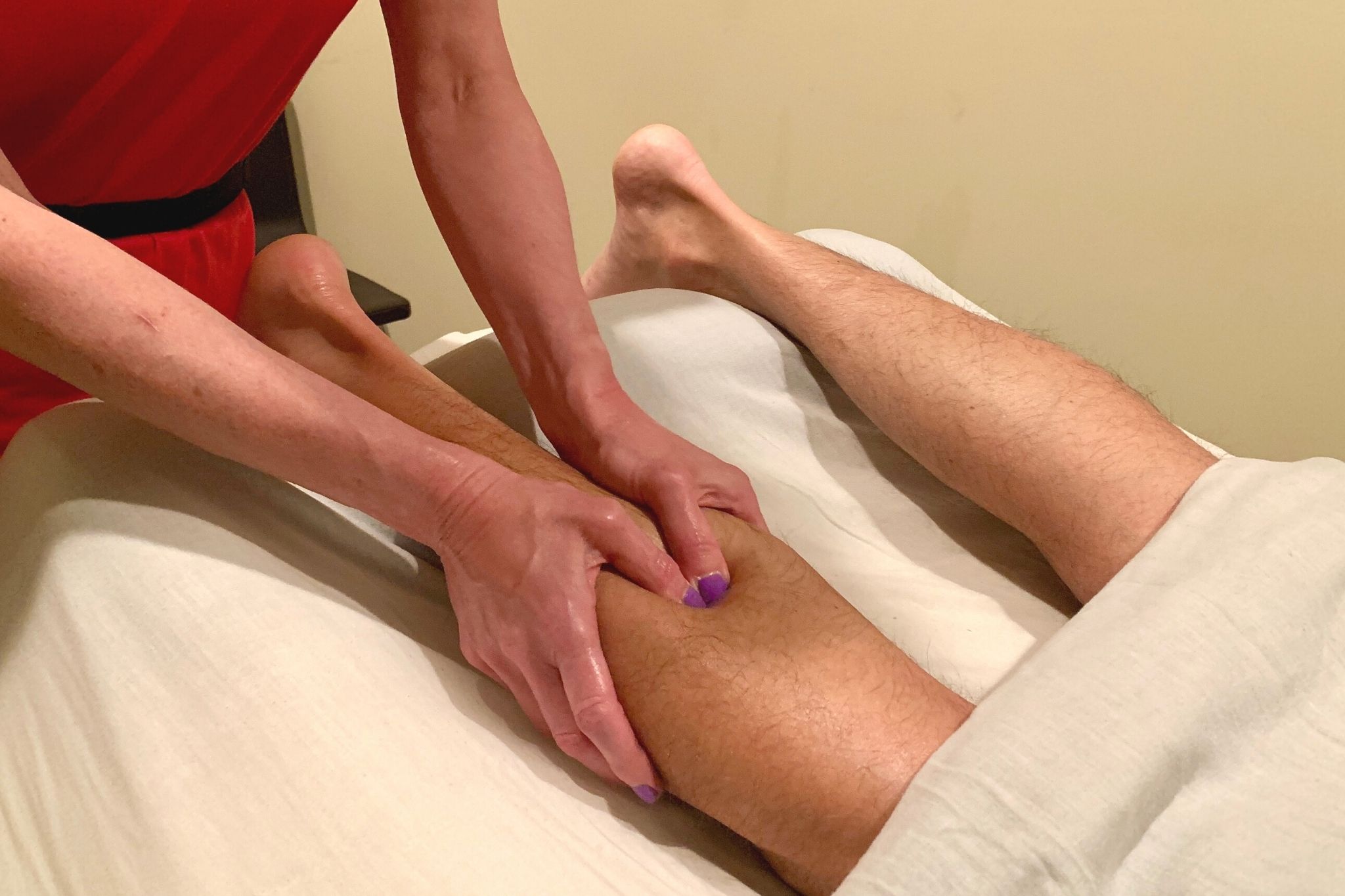 Myofascial Release Therapy on a person's leg