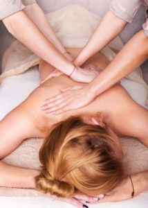 woman having a lymphatic drainage massage on her back