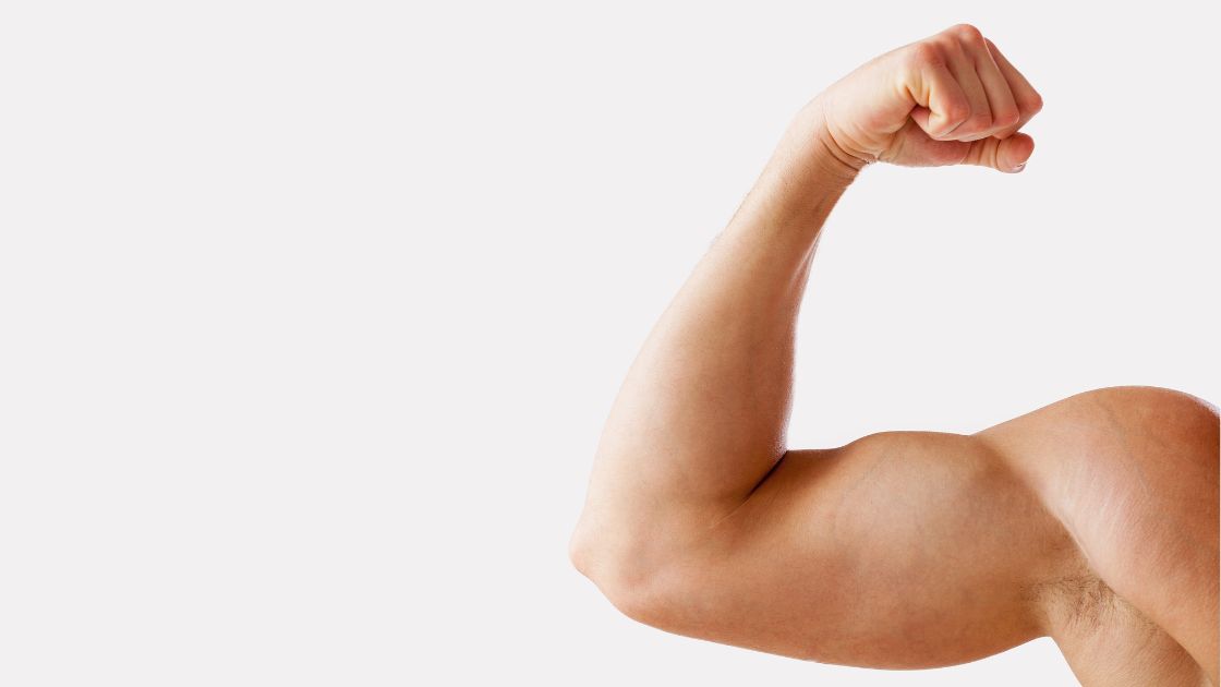 closeup of person flexing bicep muscle