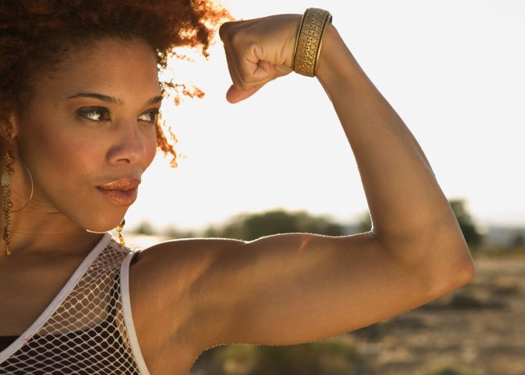 woman flexing bicep