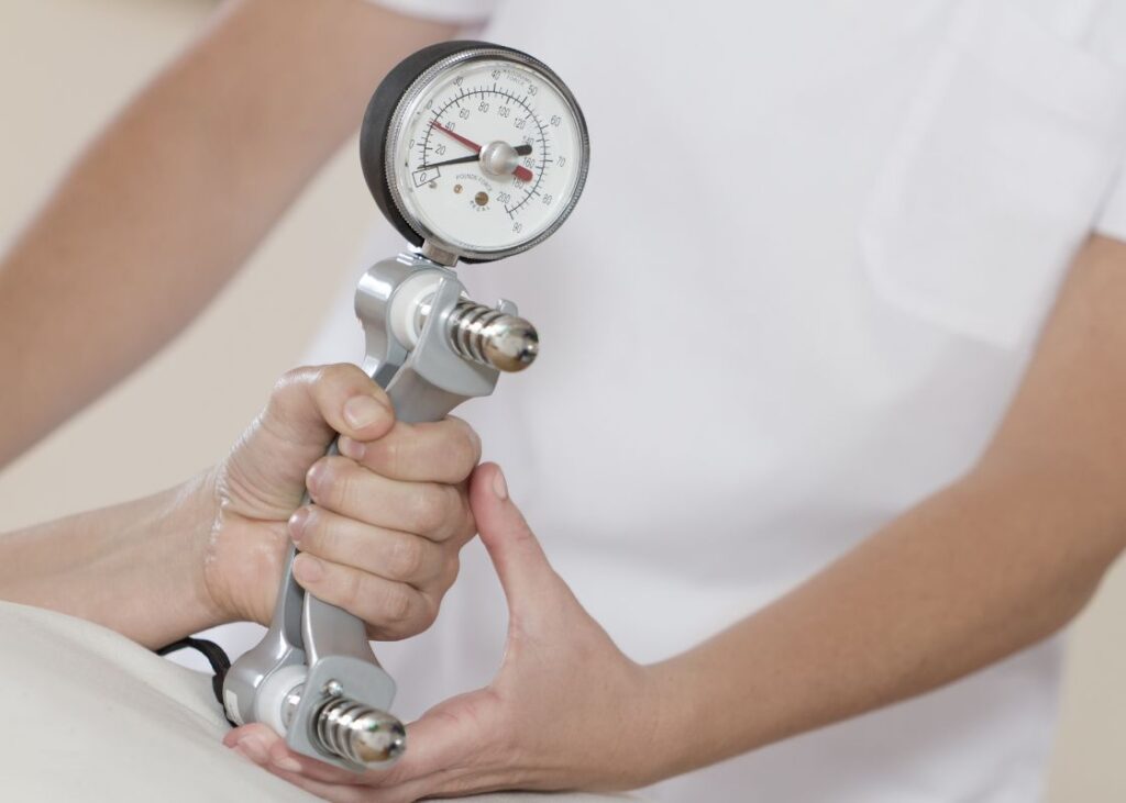 close up of dynamometer in patient's hand