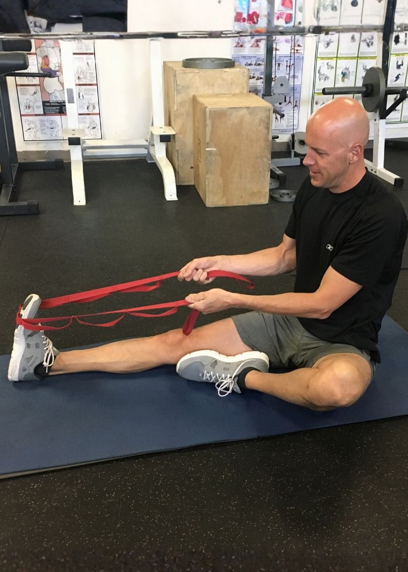 Personal Training with Dr Moyer stretching calf muscle